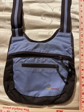 Sherpani Light Blue and Black Men’s Crossbody Belt Bag